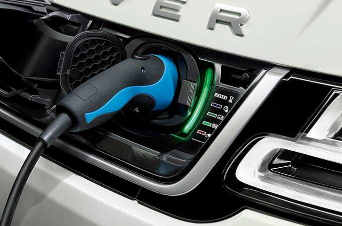 Close up of Range Rover PHEV charging.
